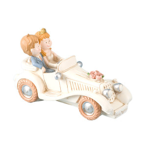 Bride & Groom in Ivory Wedding Car